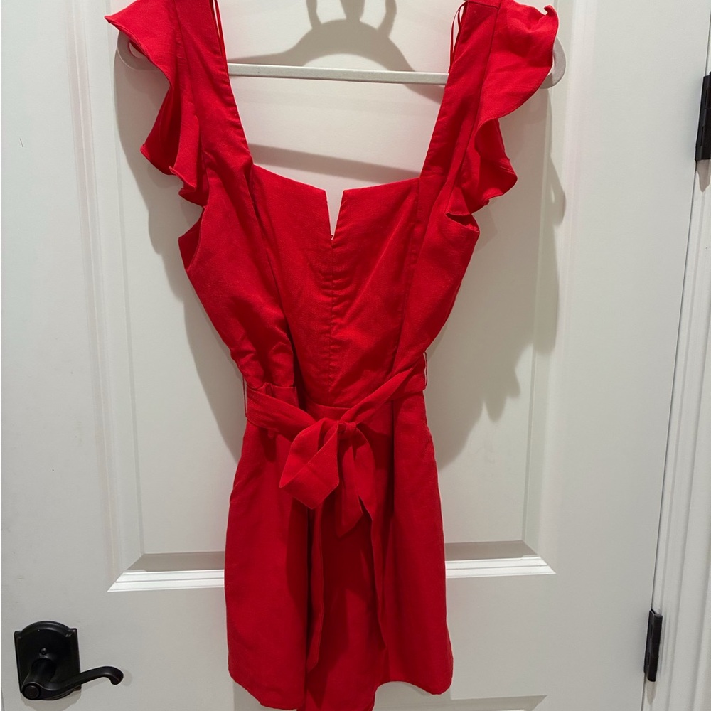 Miami for Francesca’s red summer romper.